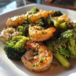 Close-up of Garlic Butter Shrimp and Broccoli Skillet, featuring plump shrimp and bright green broccoli florets coated in herbs and butter.