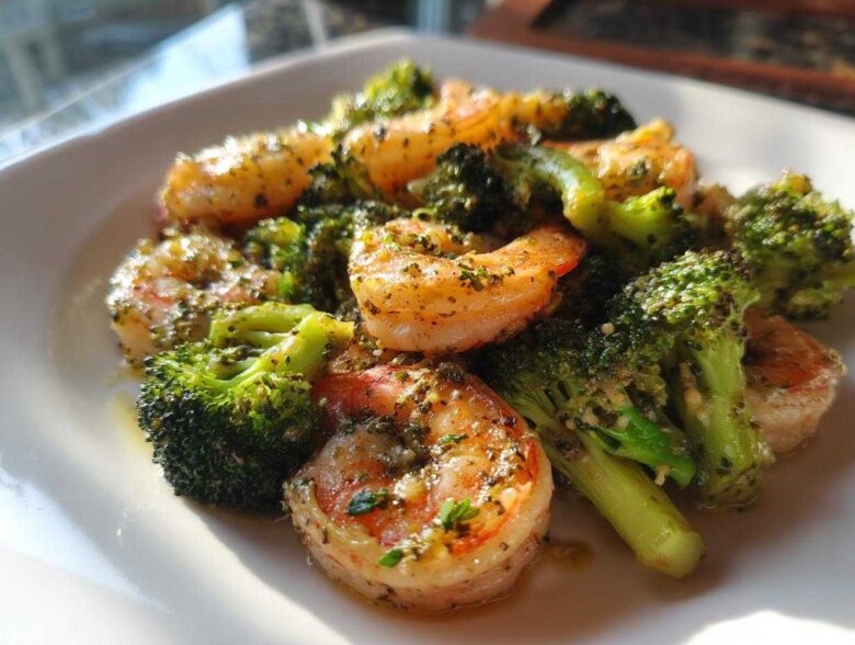 Close-up of Garlic Butter Shrimp and Broccoli Skillet, featuring plump shrimp and bright green broccoli florets coated in herbs and butter.